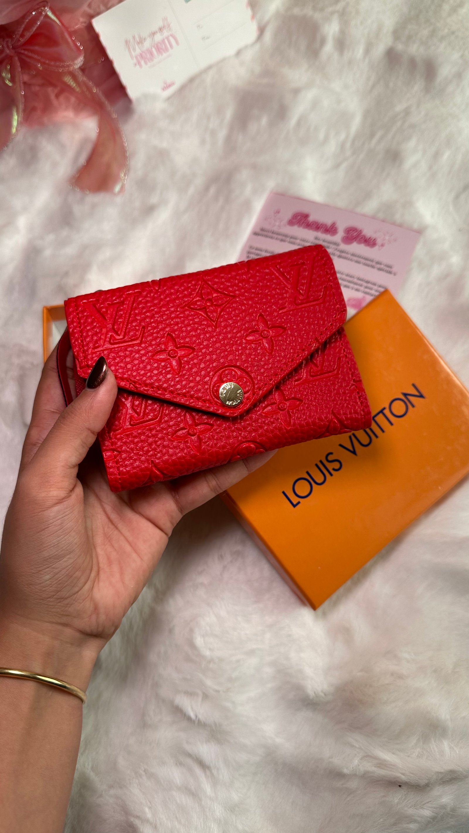 Porte monnaie louis Vuitton rouge 
